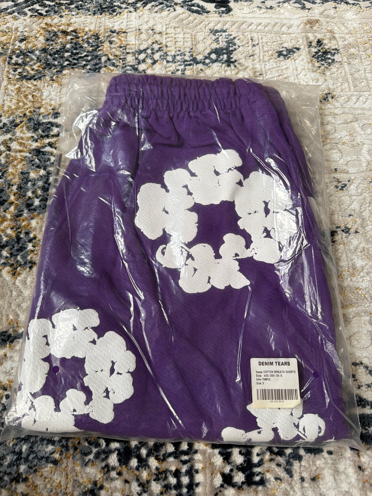 Purple denim shorts