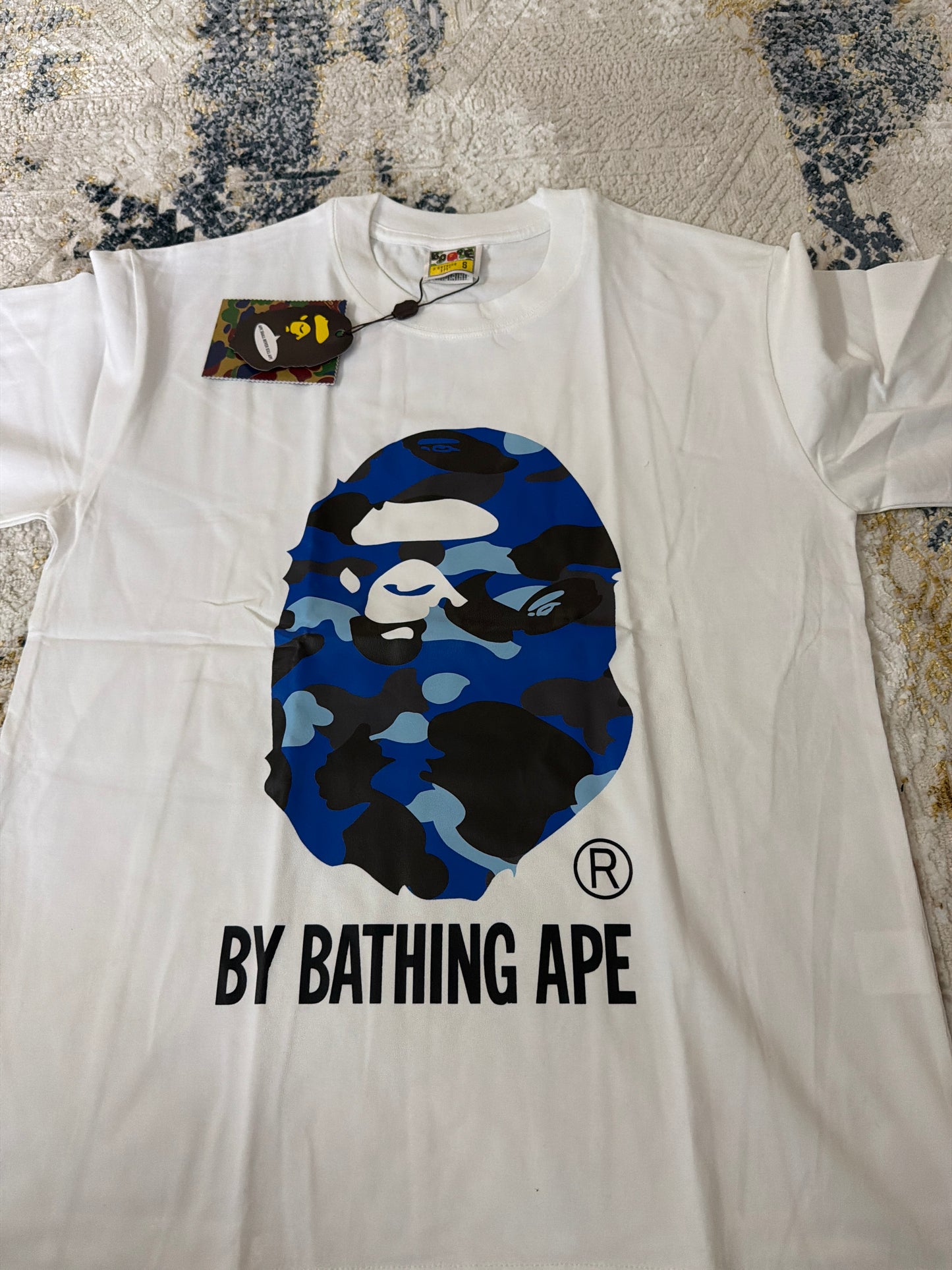 White on blue Bape tee